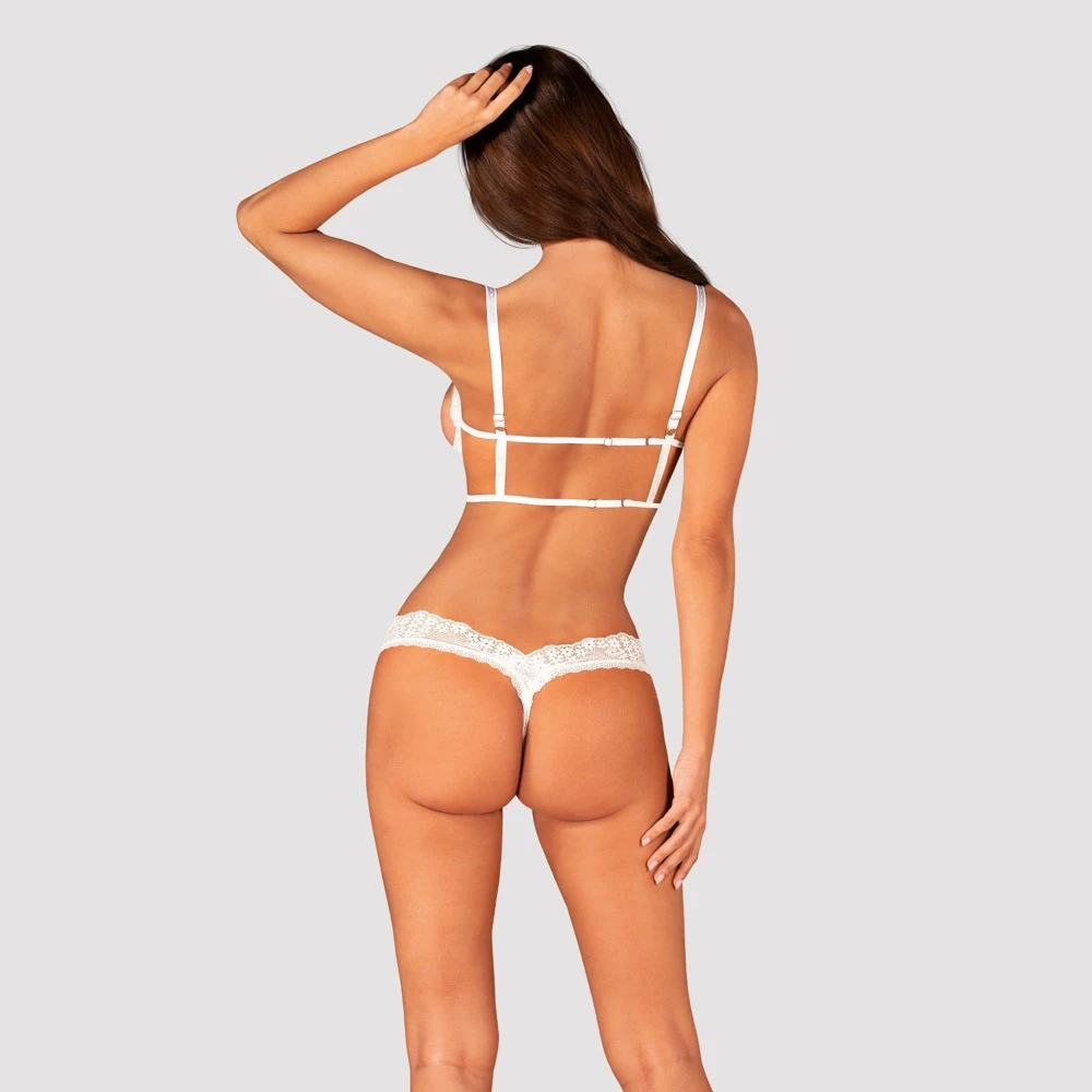 Obsessive Hebe-BH und String als weißes Ouvert-Set Heavenlly  aus weicher elastischer Blütenspitze mit verführerisch offenem Schritt.