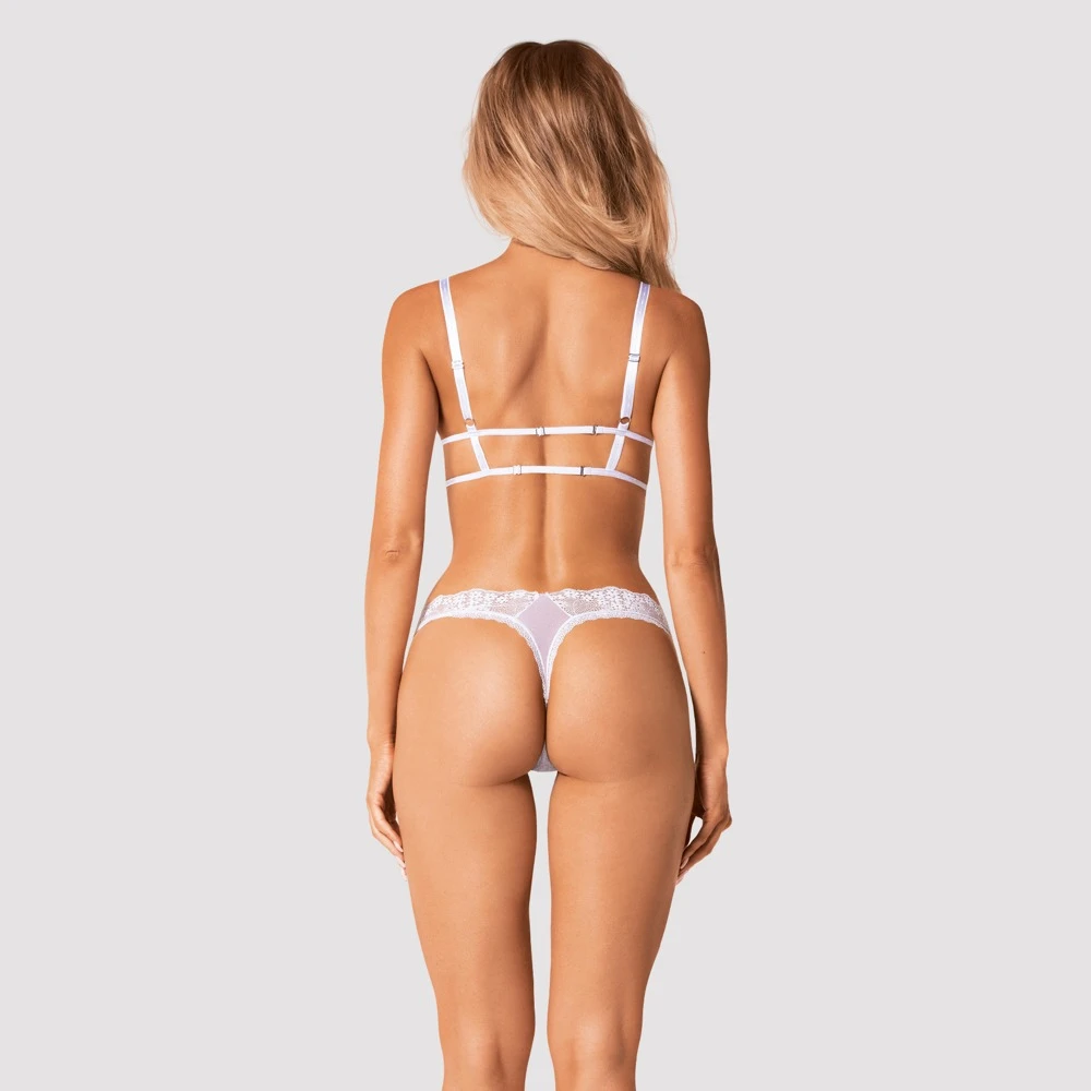 Obsessive Soft-BH und String im Set aus weißem Feinnetz mit schöner Blütenspitze verführerisch in Szene gesetz. Weich und elastisch für hohen Tragekomfort.