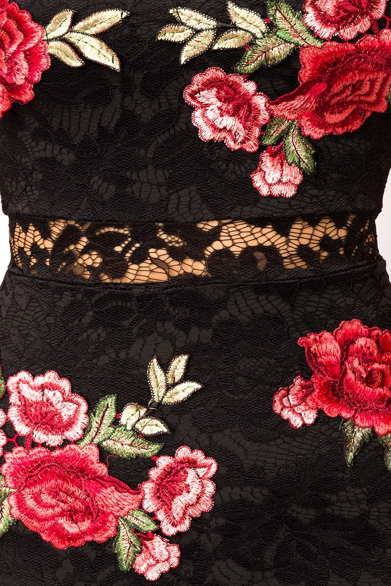 Spitzenkleid mit Blumenapplikationen