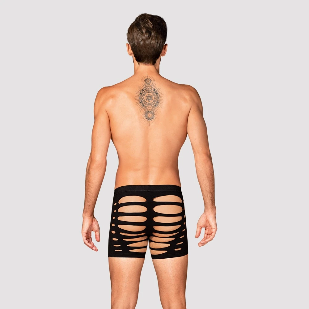 Obsessive Schwarze Radlerpants mit aufregenden Cut-outs auch über dem Po. Mit bequemem Bundgummi und rundum weich und elastisch für vollen Komfort.